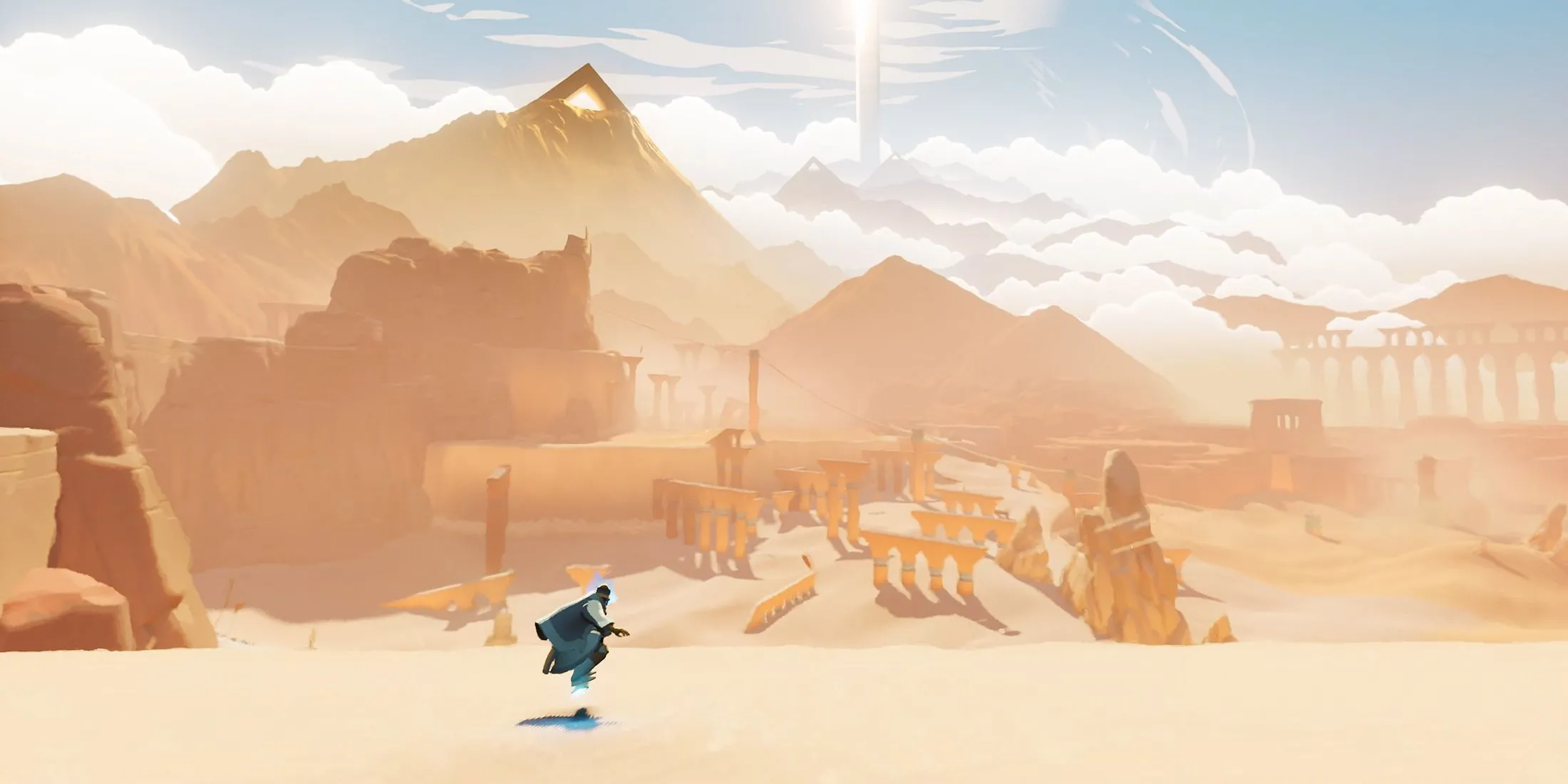 Cảnh quan hùng vĩ với núi và đại dương cát trong game phiêu lưu Sword of the Sea
