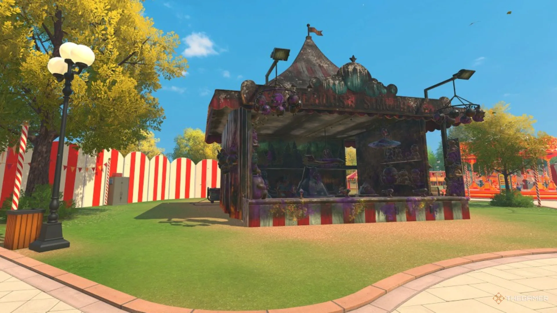 Gian hàng bắn súng hội chợ đầy bẩn trong công viên sạch của PowerWash Simulator 2.