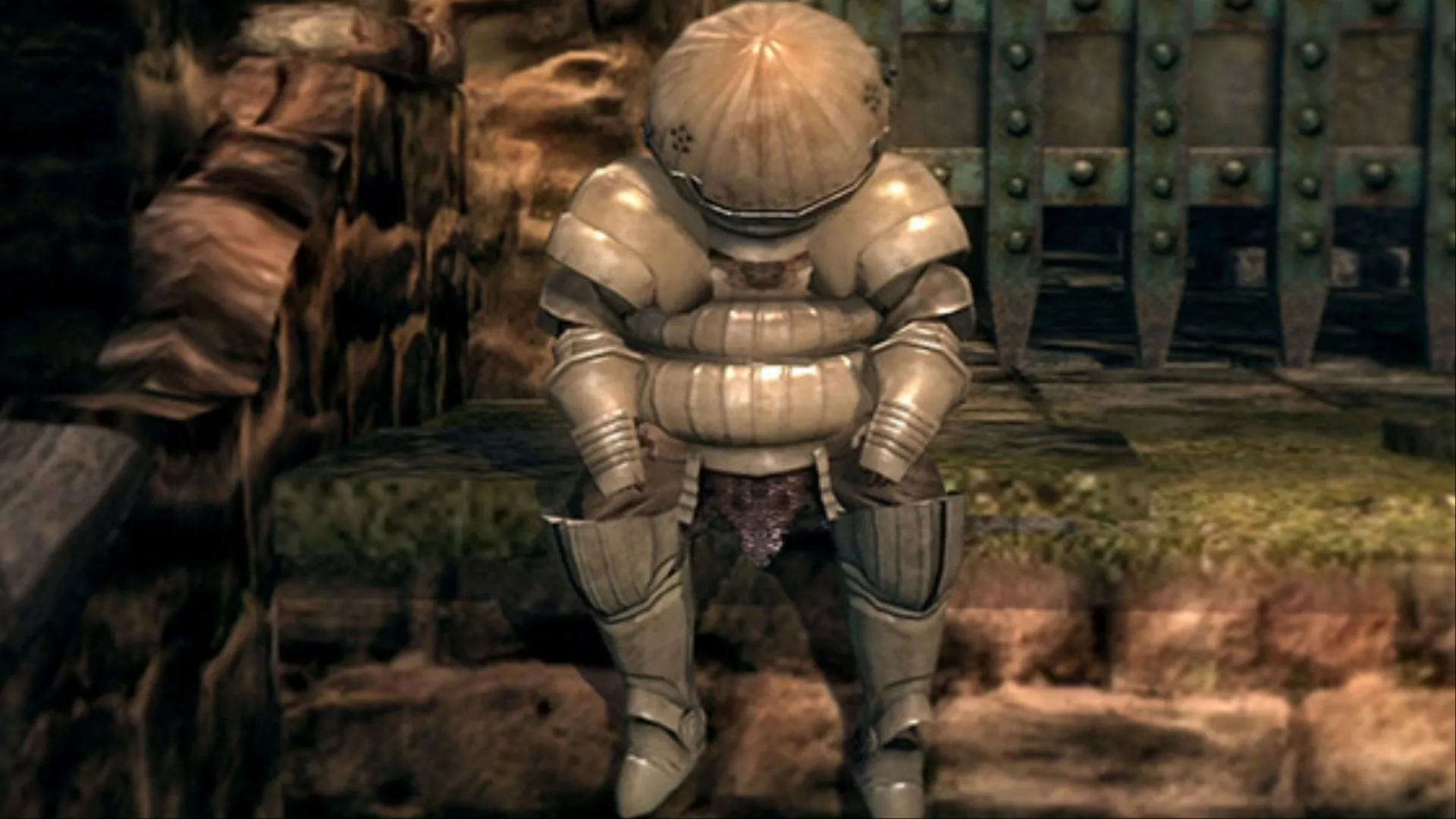 Siegmeyer of Catarina nghỉ ngơi trước cổng Sen's Fortress trong Dark Souls